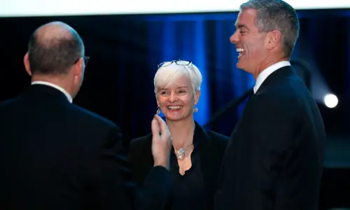 happy people speaking at work conference