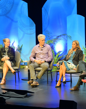 Panel of five speakers and moderator on stage at the Global Nature Positive Summit