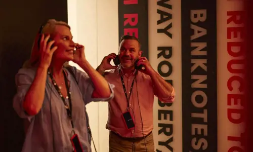 Hyde Park Barracks Sydney - people listening with earphones in a studio (Credit DNSW)