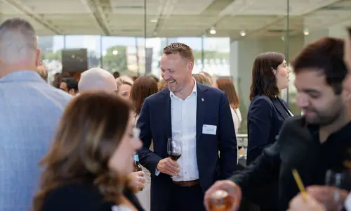 Networking event people speaking 