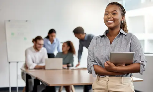 You woman leading a team in technology