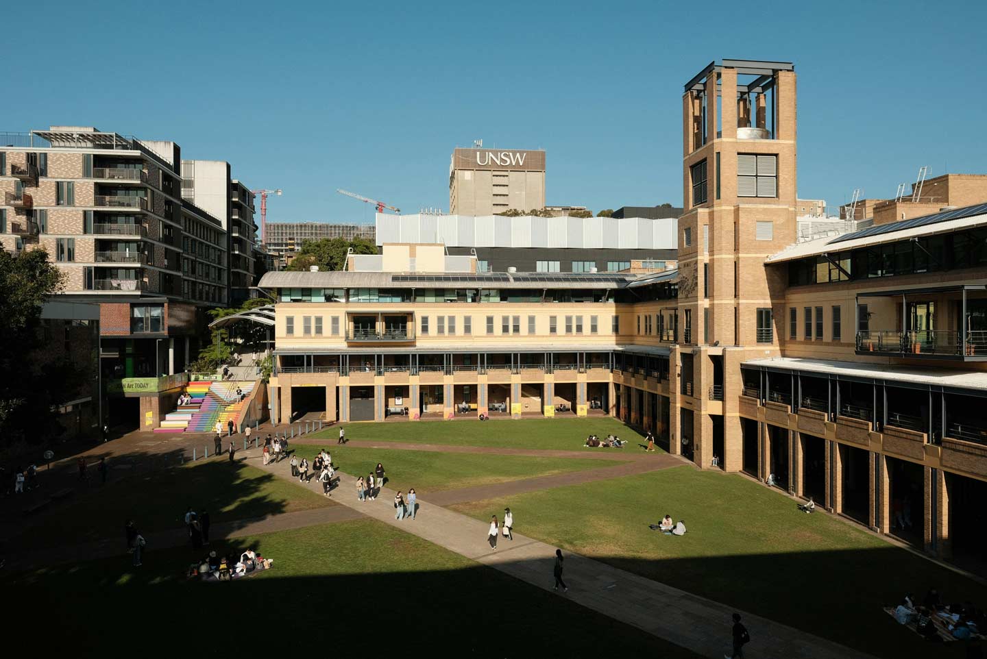 View of UNSW Sydney Quadrangle from second level of Quadrangle side buildings. Students walking across campus.