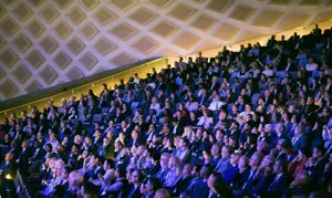 Large group of people in audience at conference