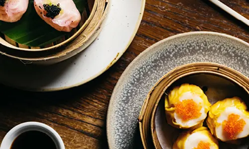Aerial view of dumpling dishes served at Mr Wong