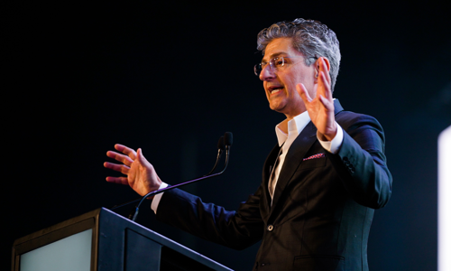 Close up view of speaker on stage at the Credai Natcon Conference