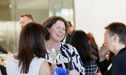 Networking event women speaking 