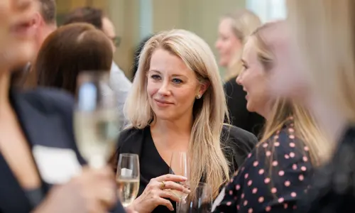 Networking event people speaking 