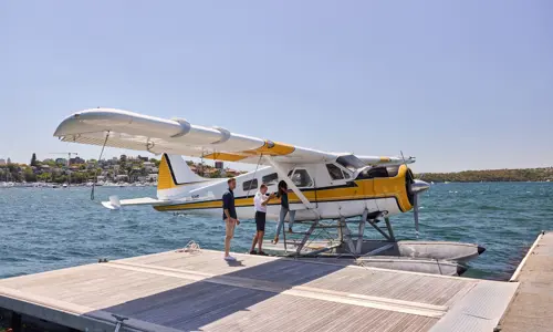 Couple getting off Sydney Seaplanes at Rose Bay