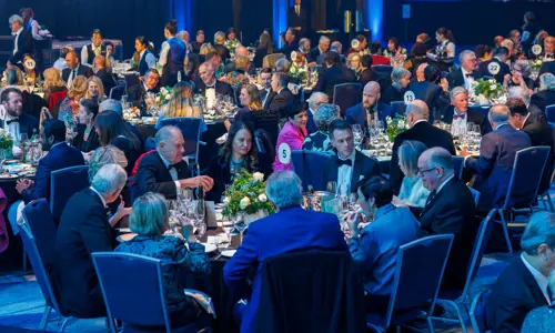 Conference dinner eating at round tables